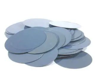 Metal flashing discs for roofing and waterproofing applications