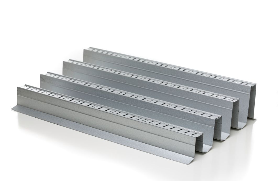Metal roofing ventilation components for commercial and residential roofing systems